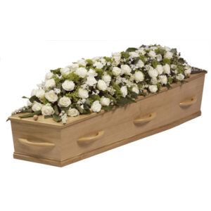 kist rouwwerk witte bloemen uitvaart